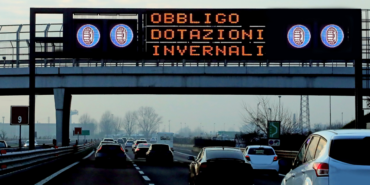 Highway tolls and snow chain signs in Italy